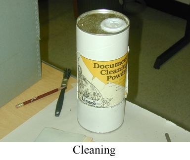Cylinder labeled document cleaning powder with caption "Cleaning".